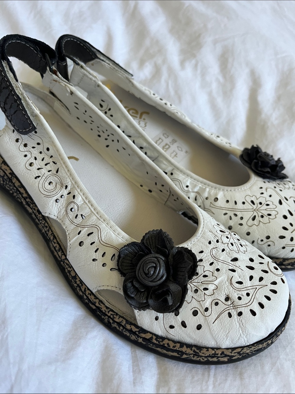 Rieker anti stress shoes white floral pattern etched cutout floral appliqué